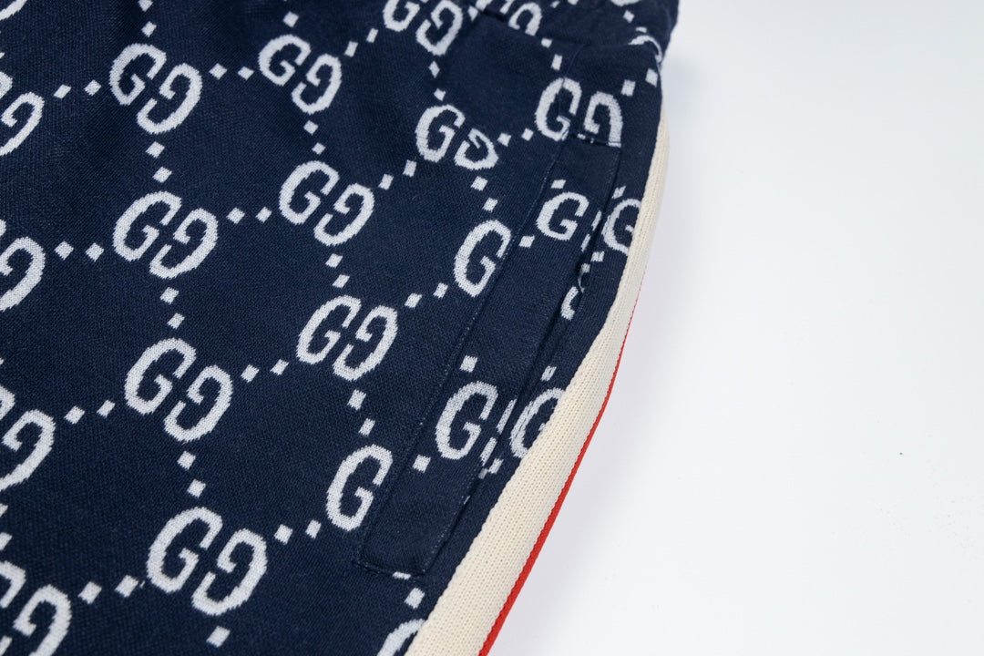 Gucci GG Monogram Jogger Pants – Navy Blue with Web Stripe