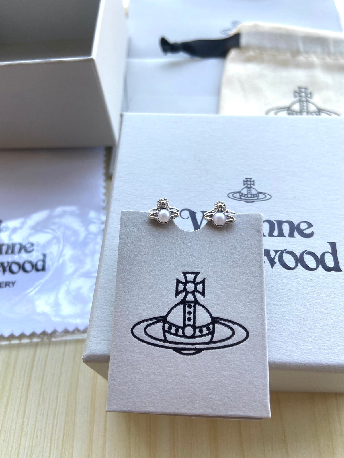 Vivienne Westwood "Pearl Planet" Stud Earrings
