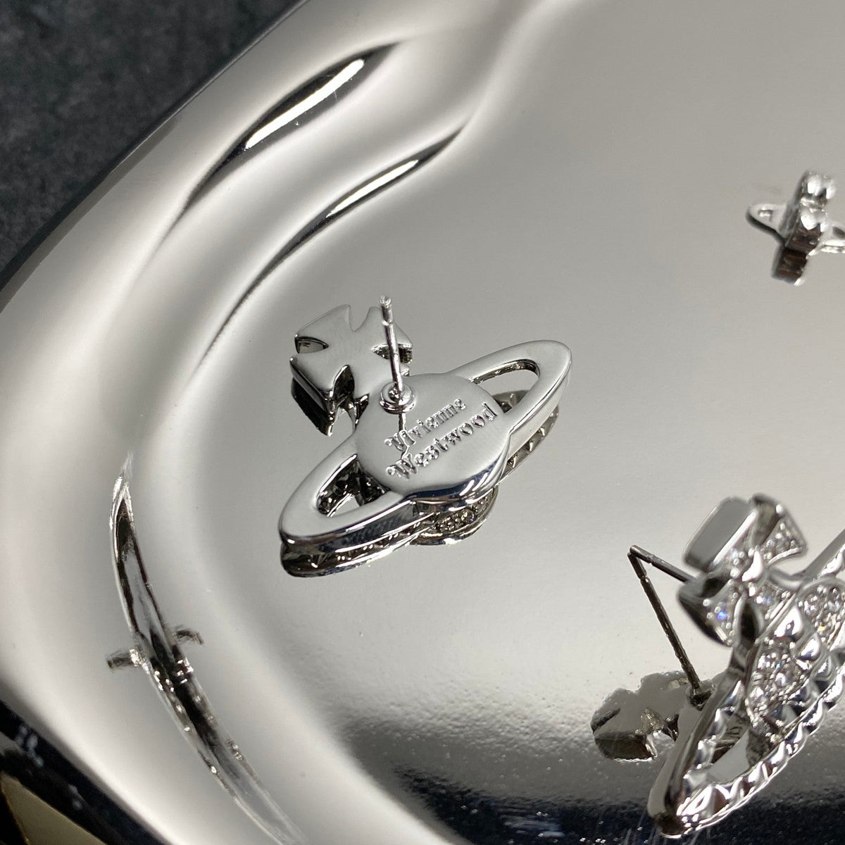 Vivienne Westwood Minimalist Planet & Cross Stud Earrings