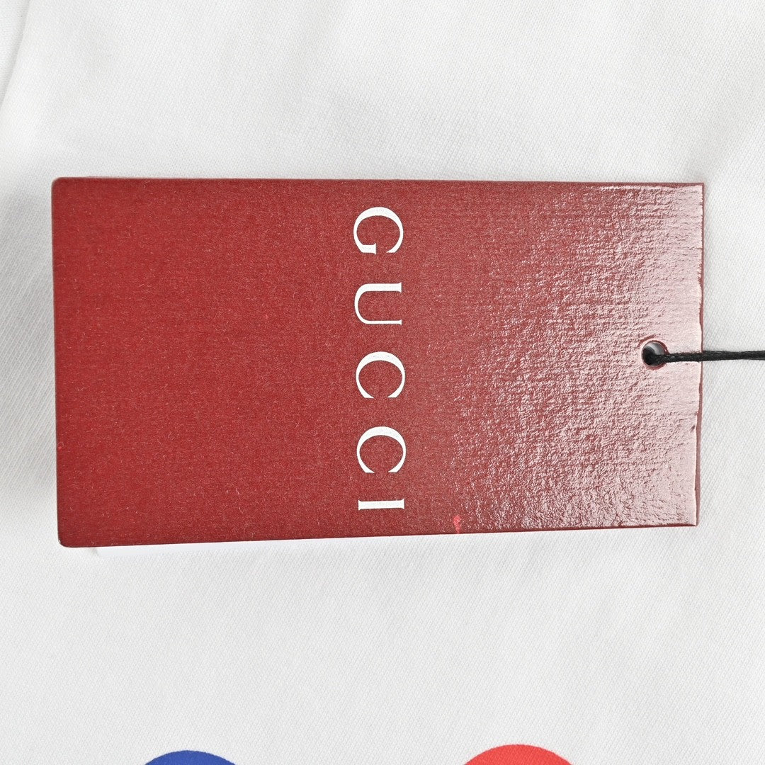 Gucci Interlocking GG Multi-Direction Logo Print T-Shirt