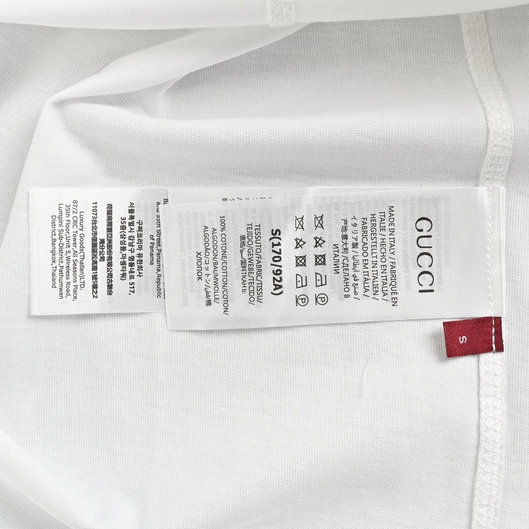 Gucci Interlocking GG Multi-Direction Logo Print T-Shirt
