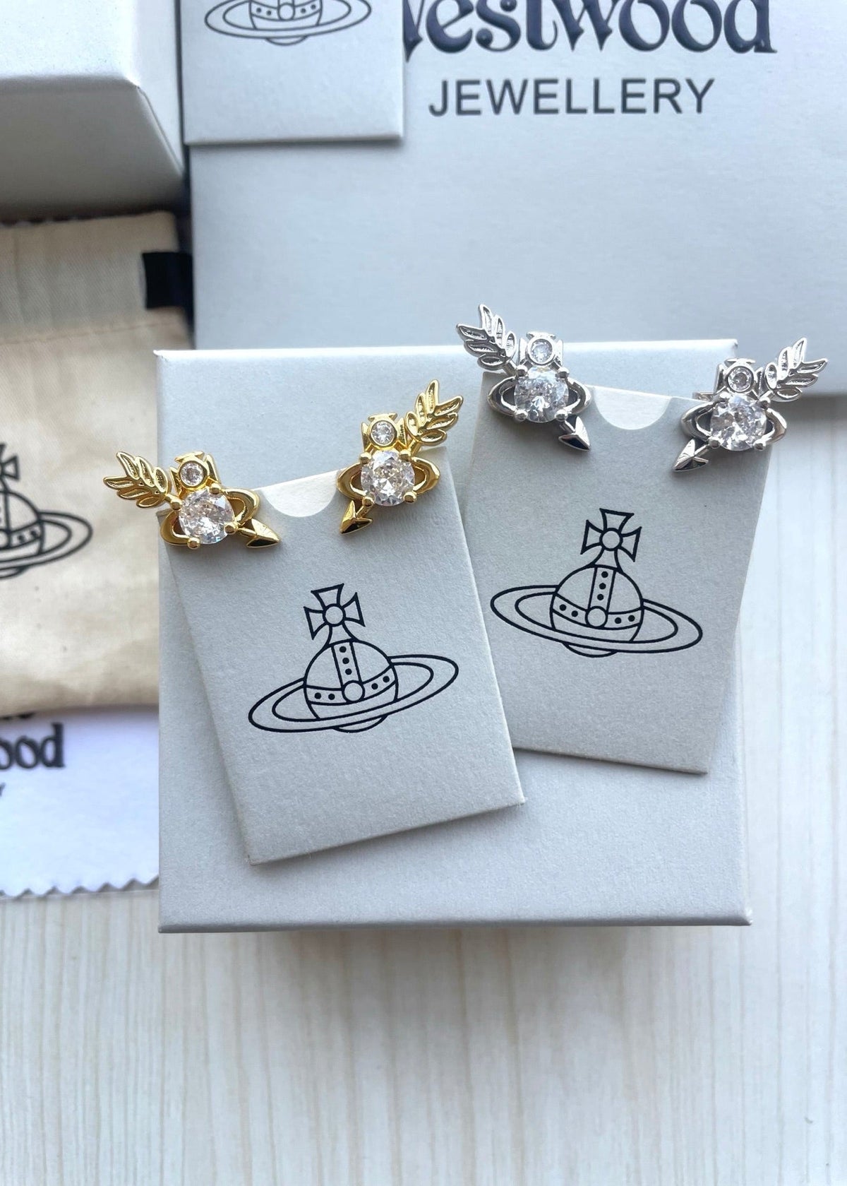 Vivienne Westwood "Arrow Through the Heart" Stud Earrings