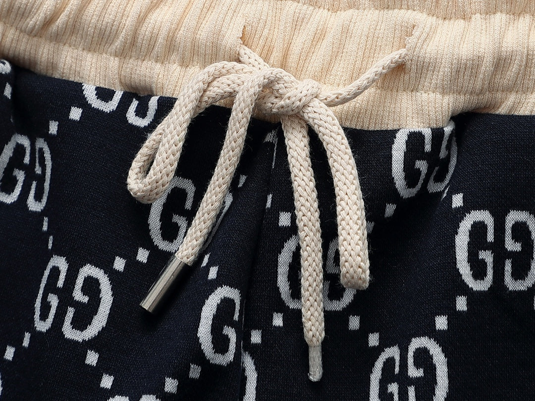 Gucci GG Monogram Jogger Pants with Embroidered Crest