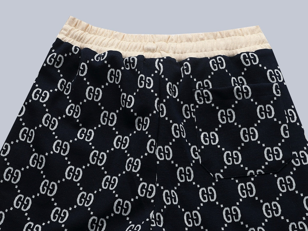 Gucci GG Monogram Jogger Pants with Embroidered Crest
