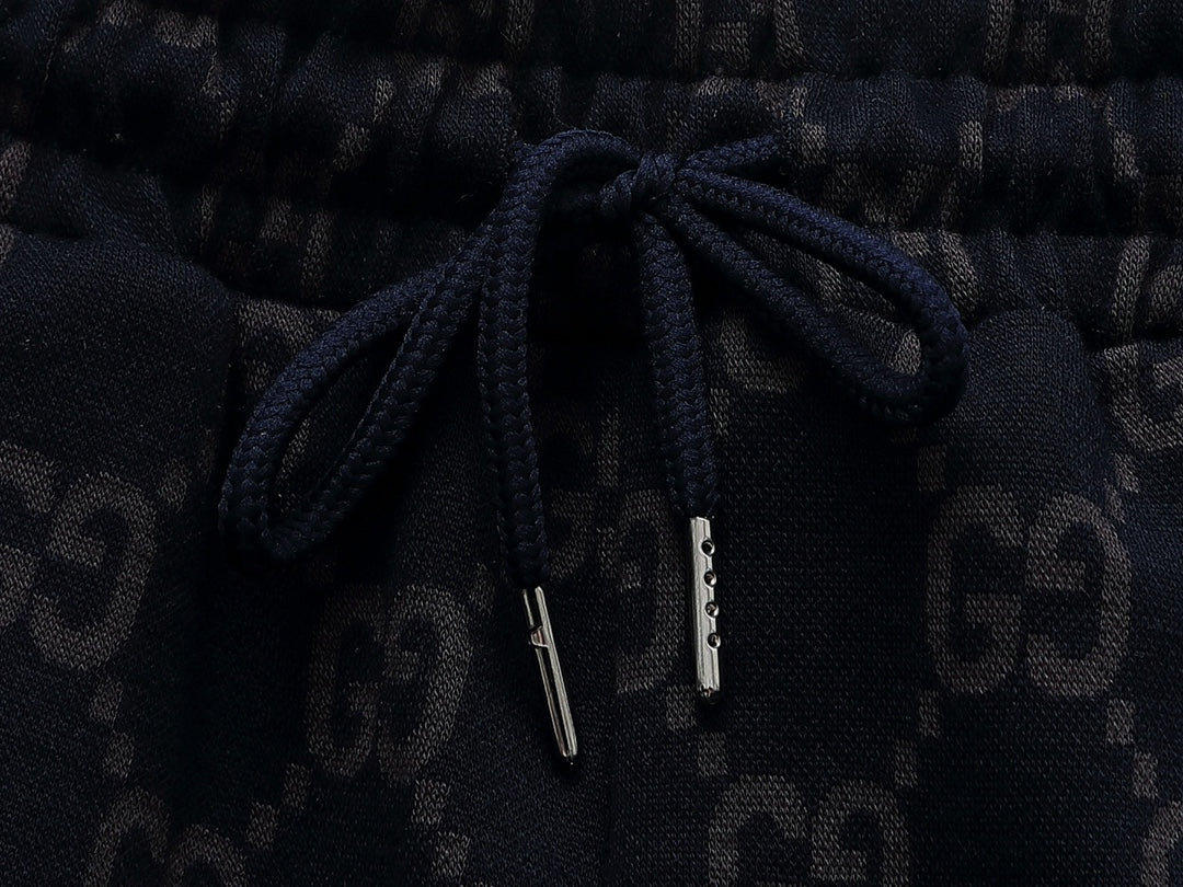 Gucci GG Monogram Jogger Pants with Web Stripe