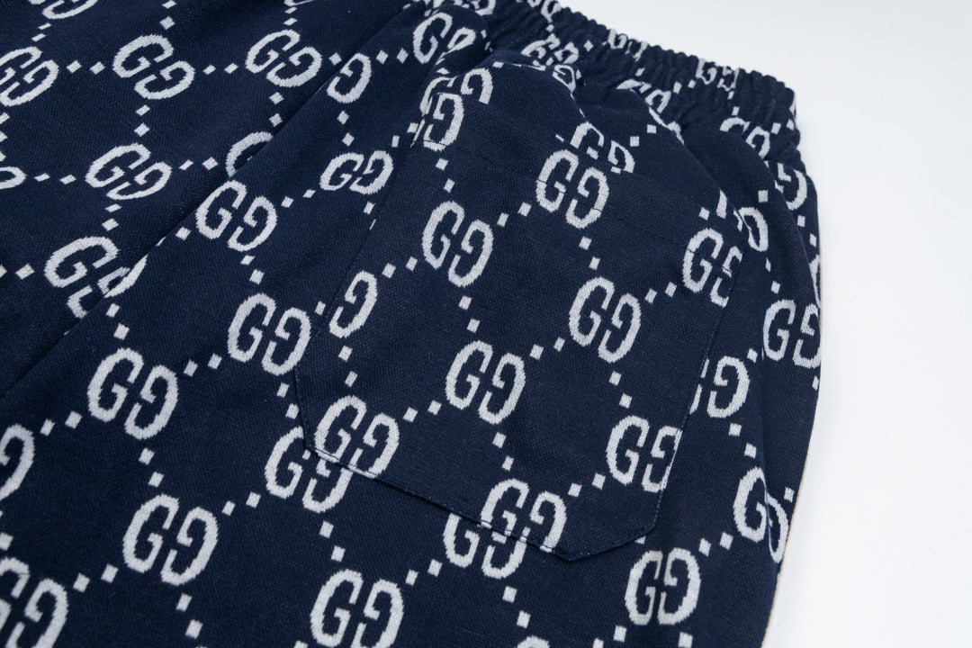 Gucci GG Monogram Jogger Pants – Navy Blue with Web Stripe