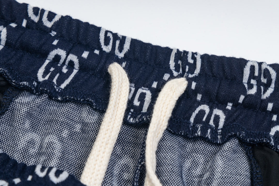 Gucci GG Monogram Jogger Pants – Navy Blue with Web Stripe