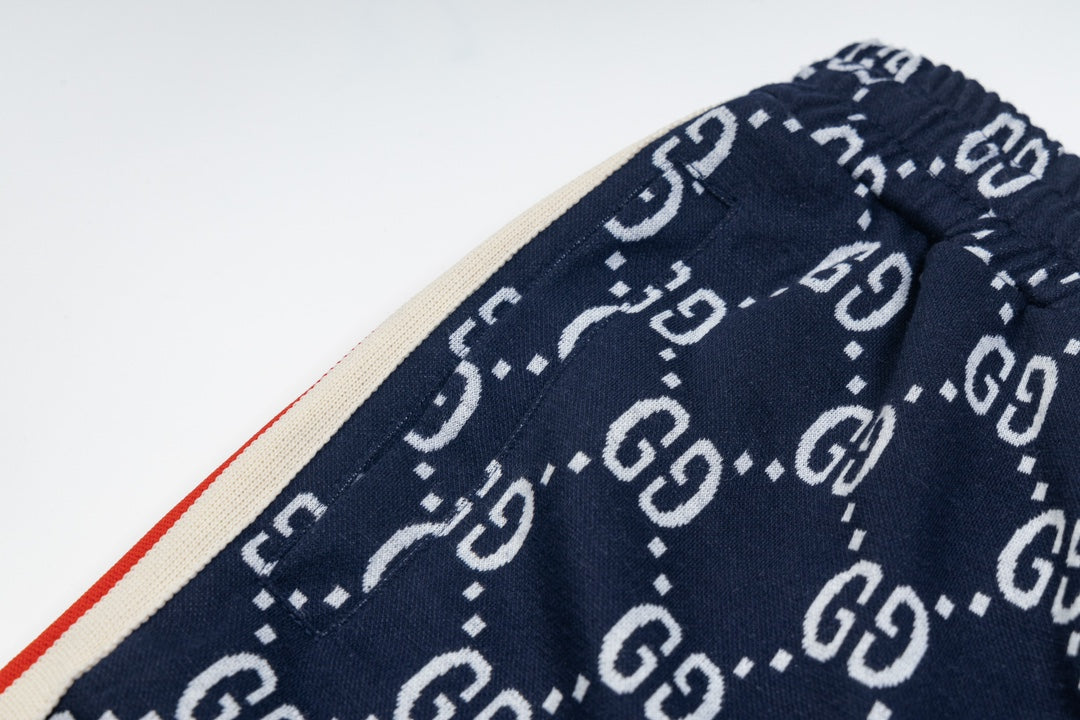 Gucci GG Monogram Jogger Pants – Navy Blue with Web Stripe