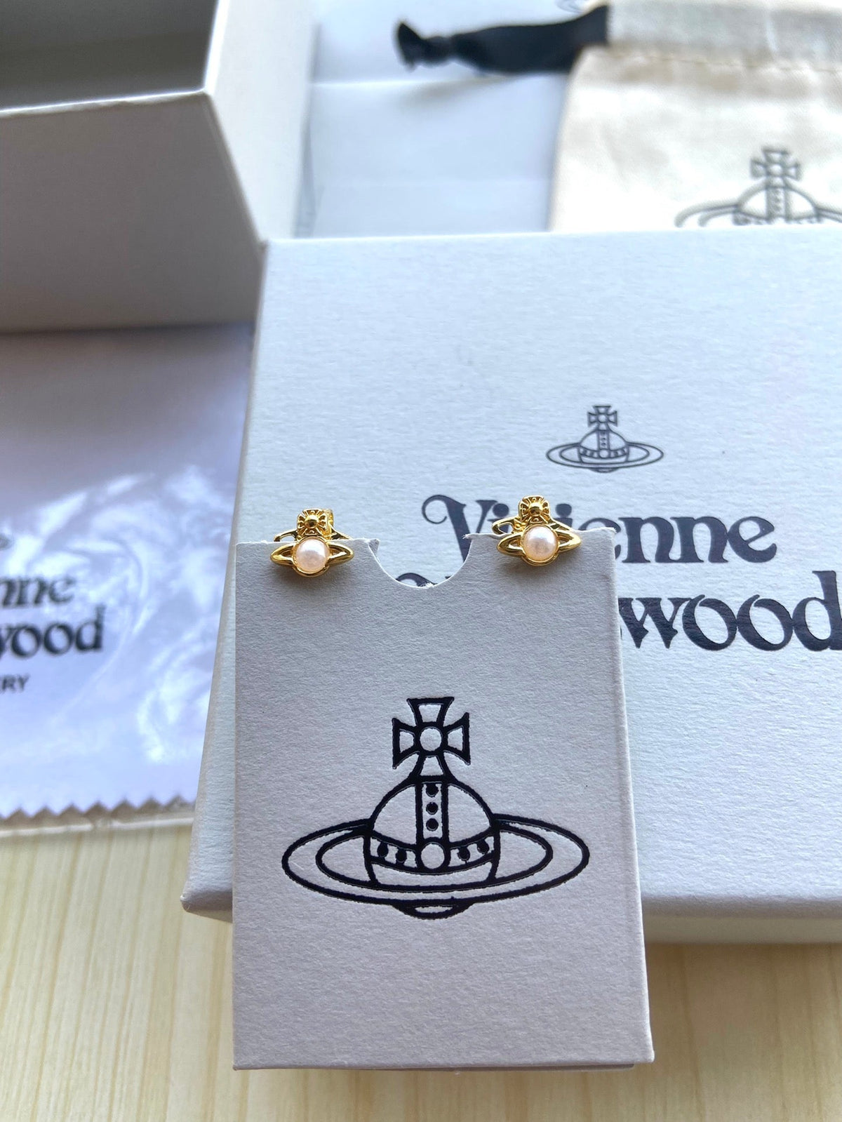 Vivienne Westwood "Pearl Planet" Stud Earrings