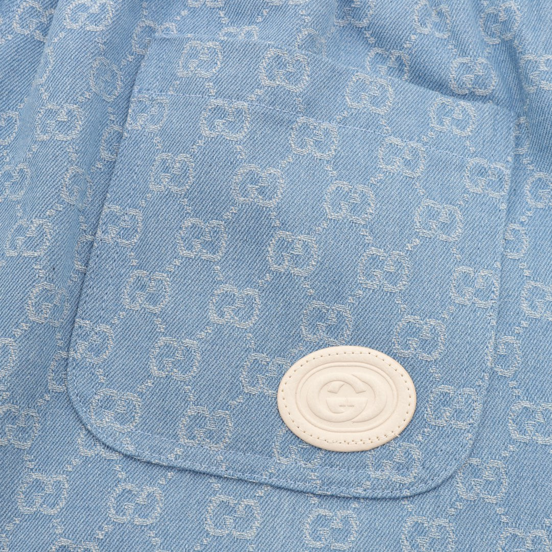 Gucci GG Monogram Denim Shorts with Web Stripe